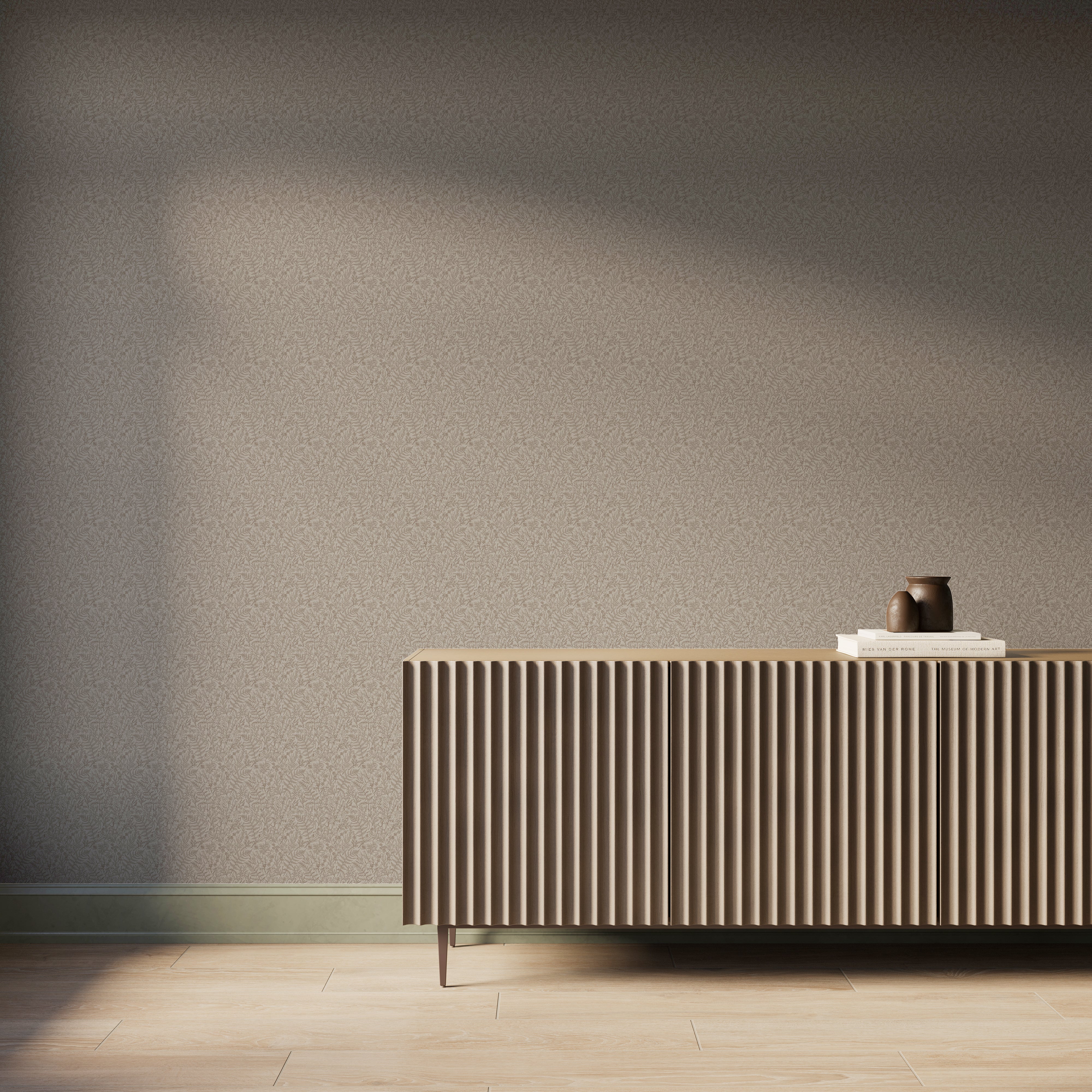 Modern interior featuring taupe botanical wallpaper with a soft hand-sketched foliage texture, paired with a fluted wood console cabinet, light wood flooring, and warm natural light casting gentle shadows across the wall.