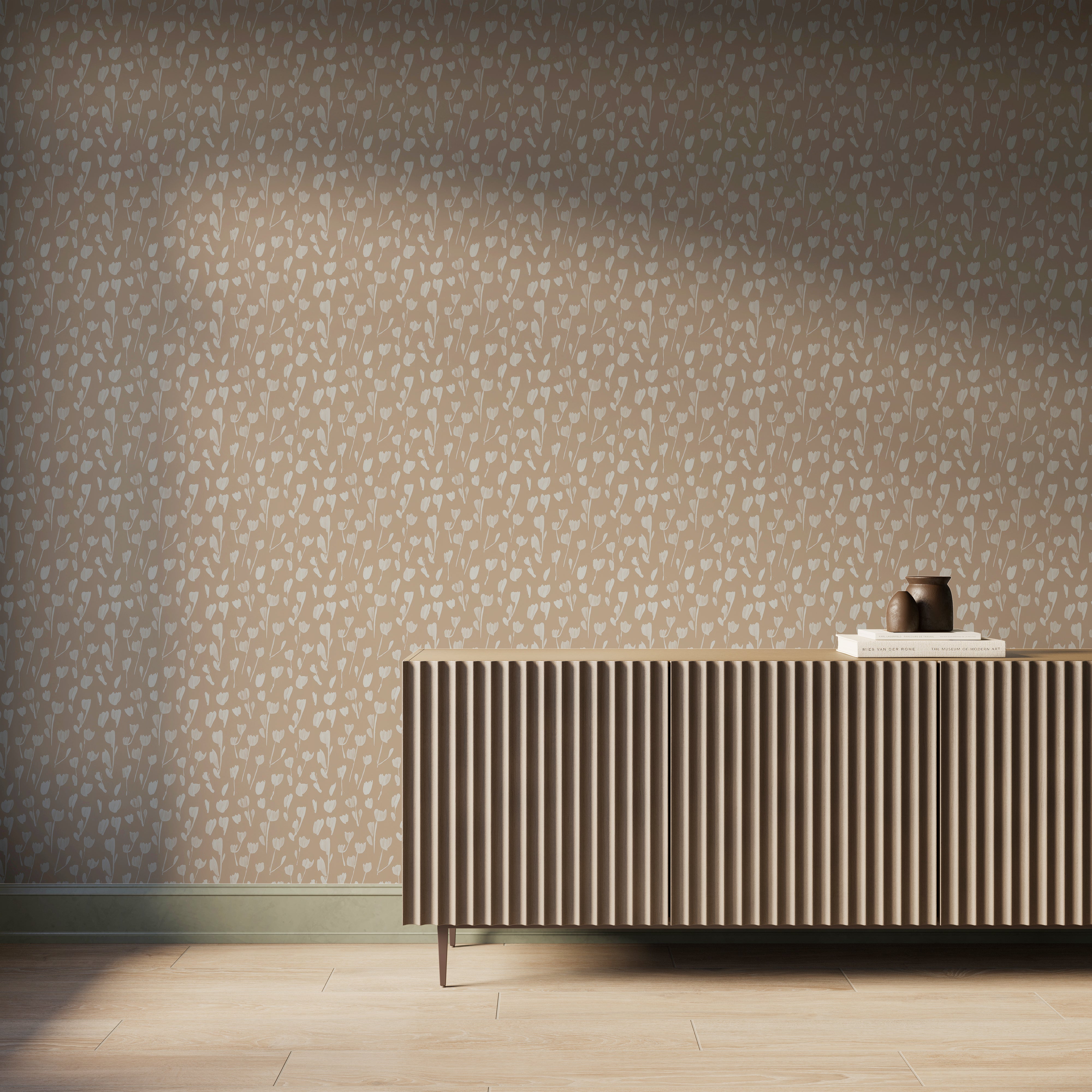 Petaline wallpaper in Tan II styled behind a ribbed wood console, with off-white floral silhouettes repeating across a light brown wall, suited for warm contemporary interiors.
