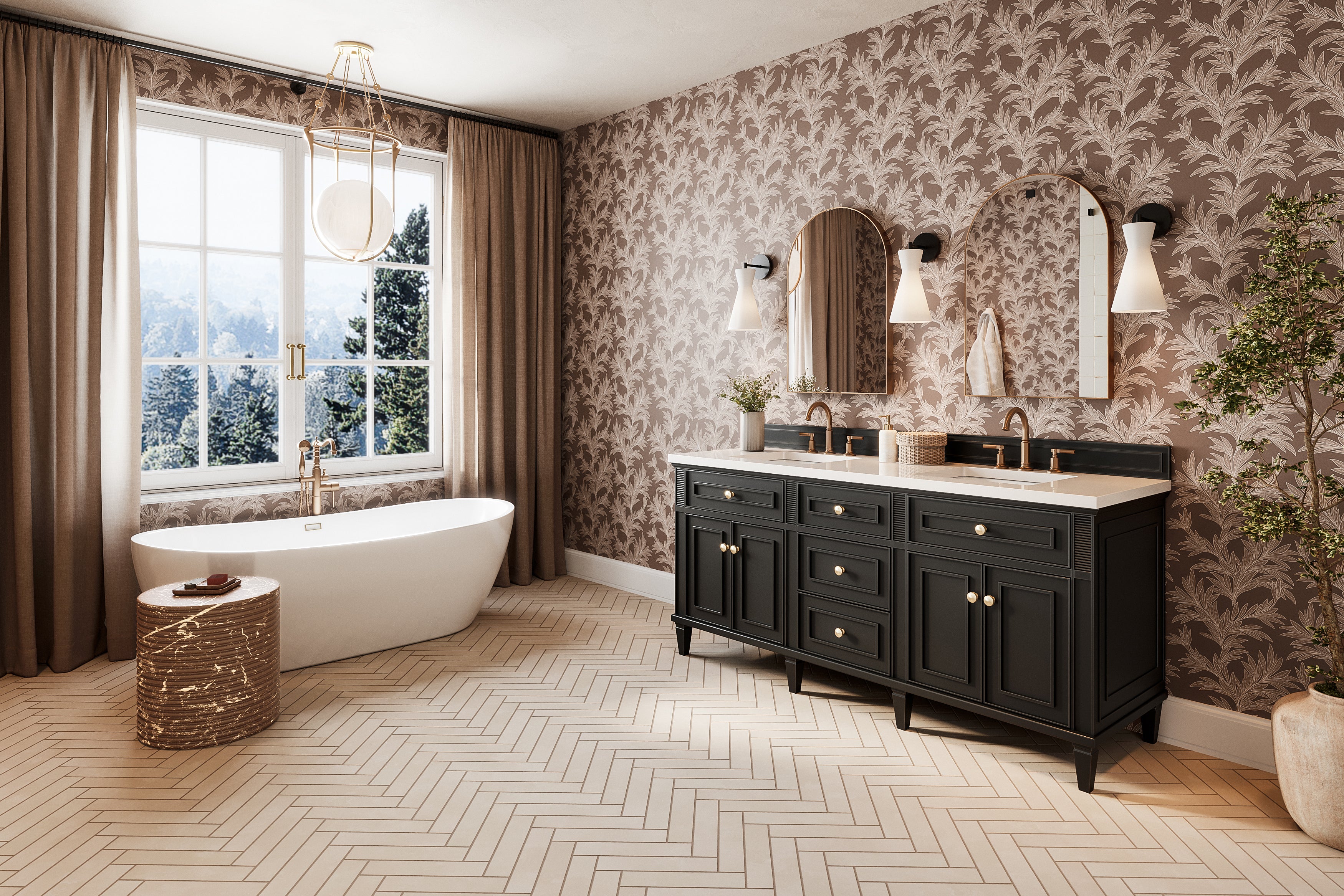 Elegant bathroom with black Elodie double vanity, freestanding white bathtub by a large window, brass fixtures, botanical wallpaper, and herringbone tile flooring.
