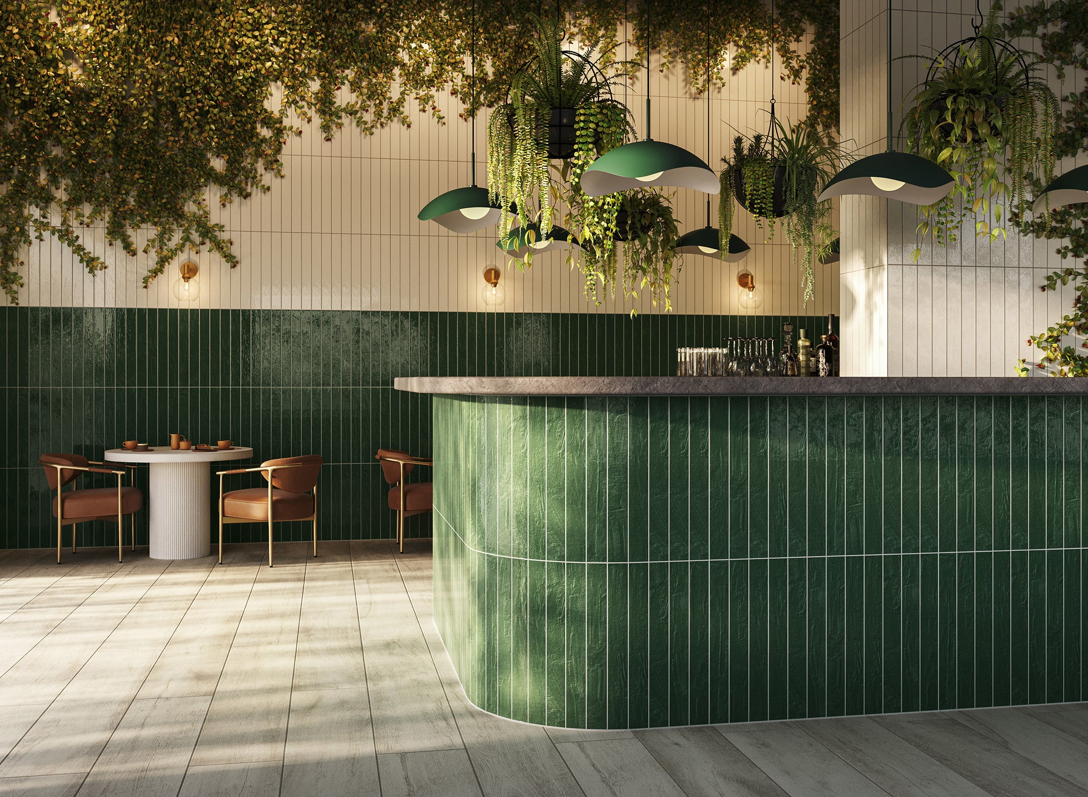 Modern café interior with green subway tile bar, hanging plants, wall sconces, green pendant lights and wood look tile flooring.
